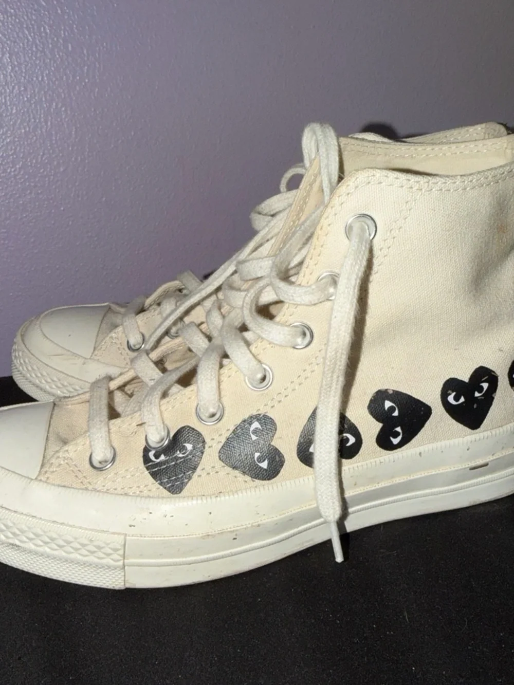 Converse Cream High-Top Sneakers with Black Heart Motif